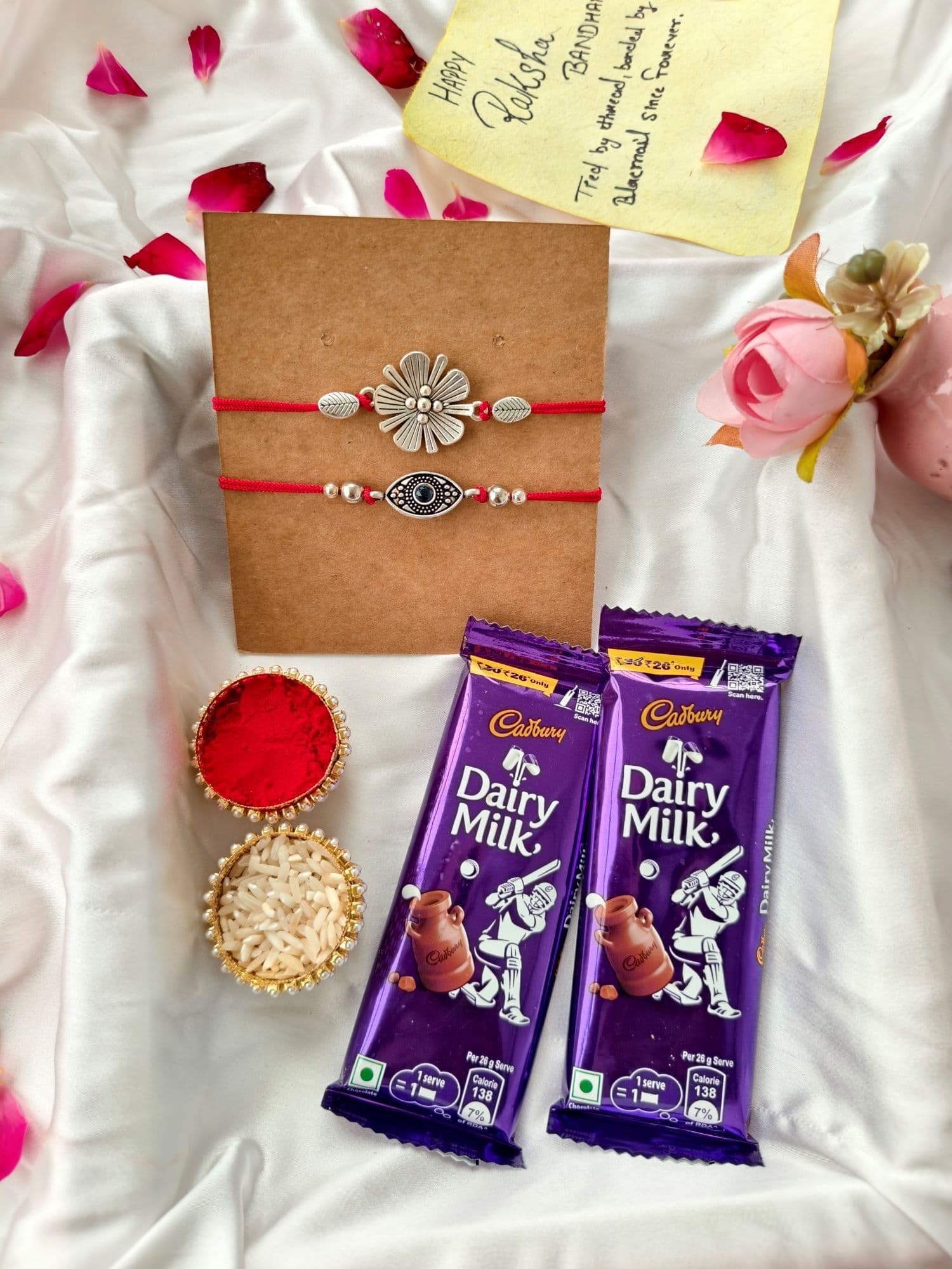 Silver Evil Eye & Floral Rakhi with Dairy Milk Chocolate Hamper for Brother