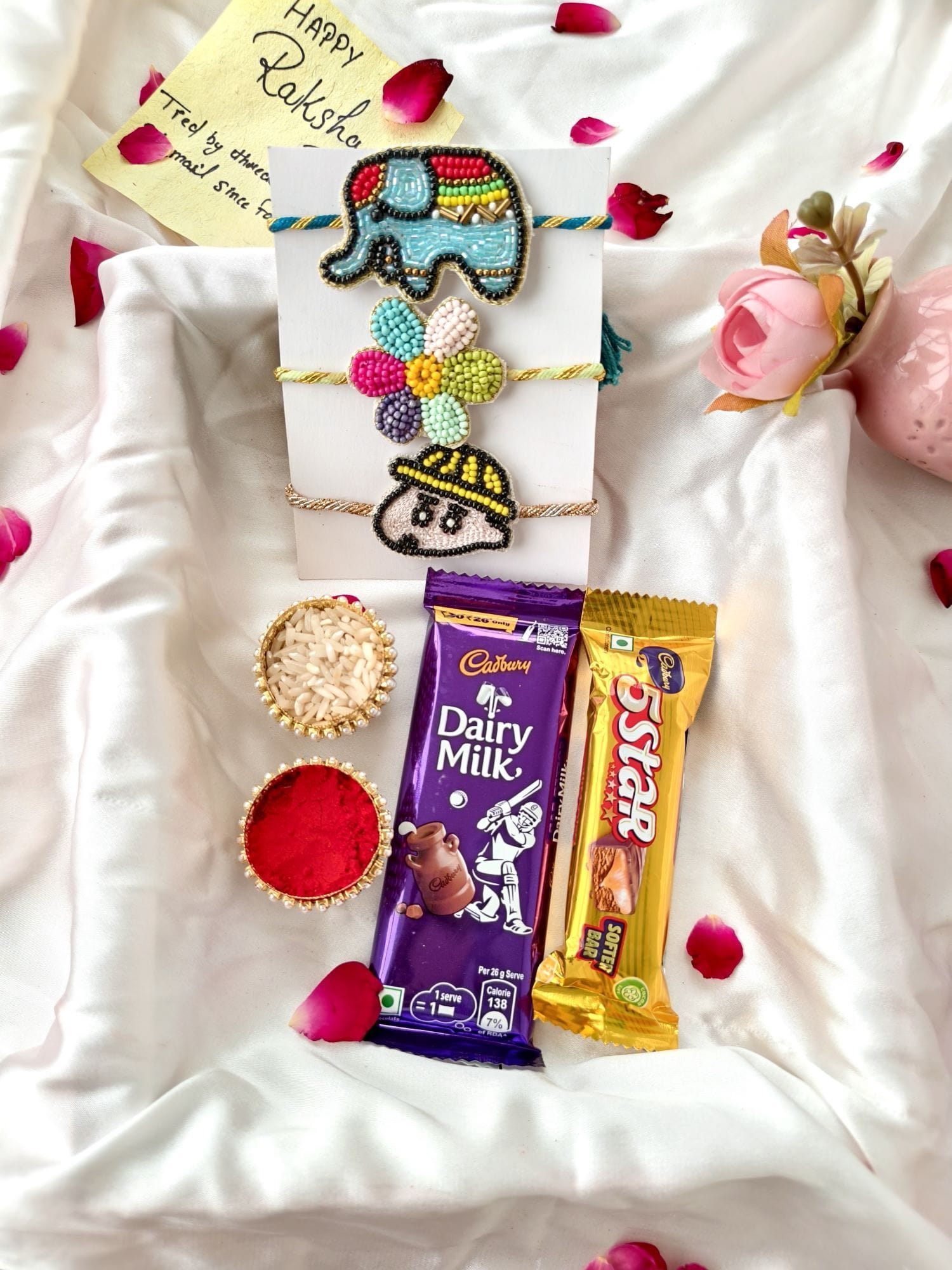 Handmade Trio - Cute Rakhi with KitKat Chocolate & Roli Chawal Hamper
