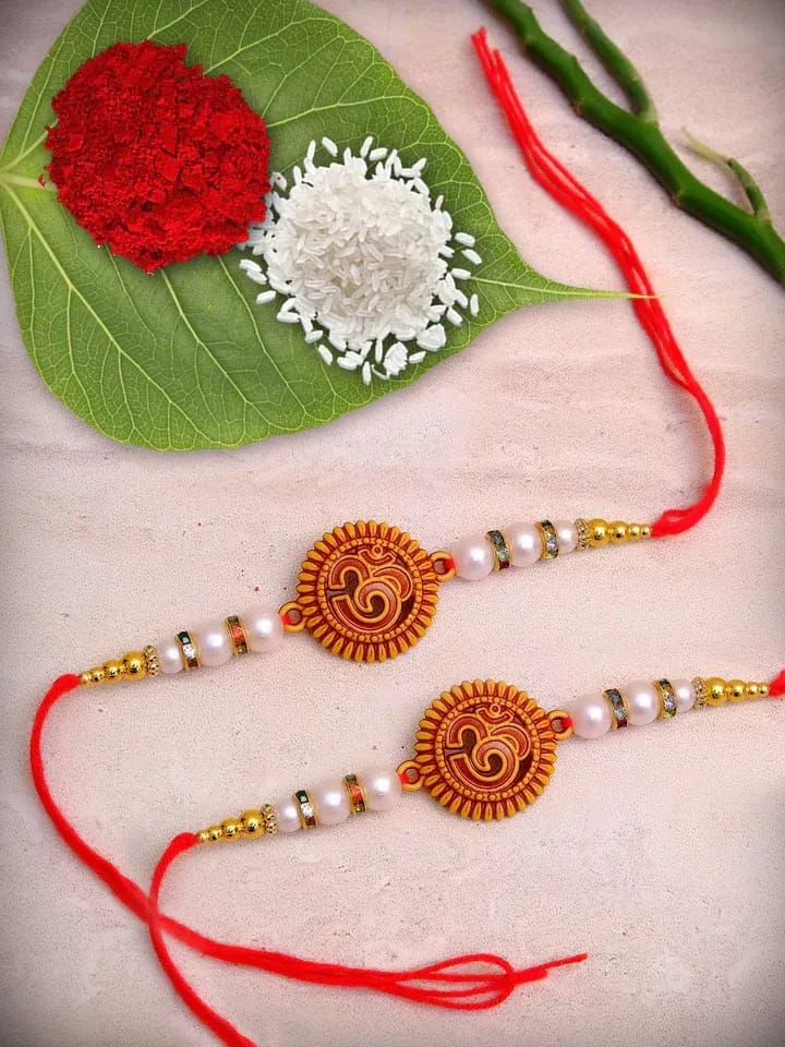 Om Pearl Rakhi Combo Set with Traditional Bead Design