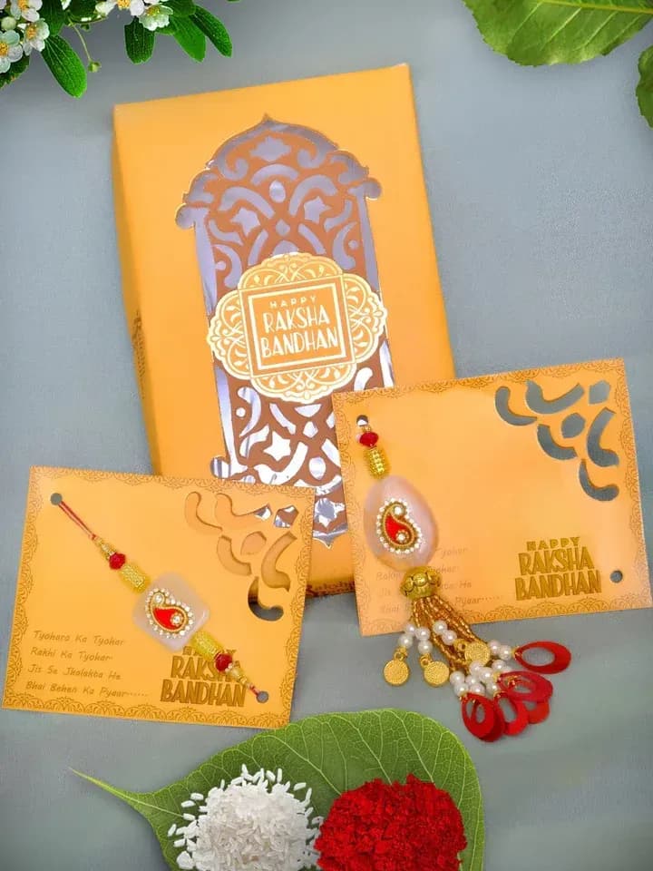 Elegant Red Paisley Kundan Bhaiya Bhabhi Lumba Rakhi Set