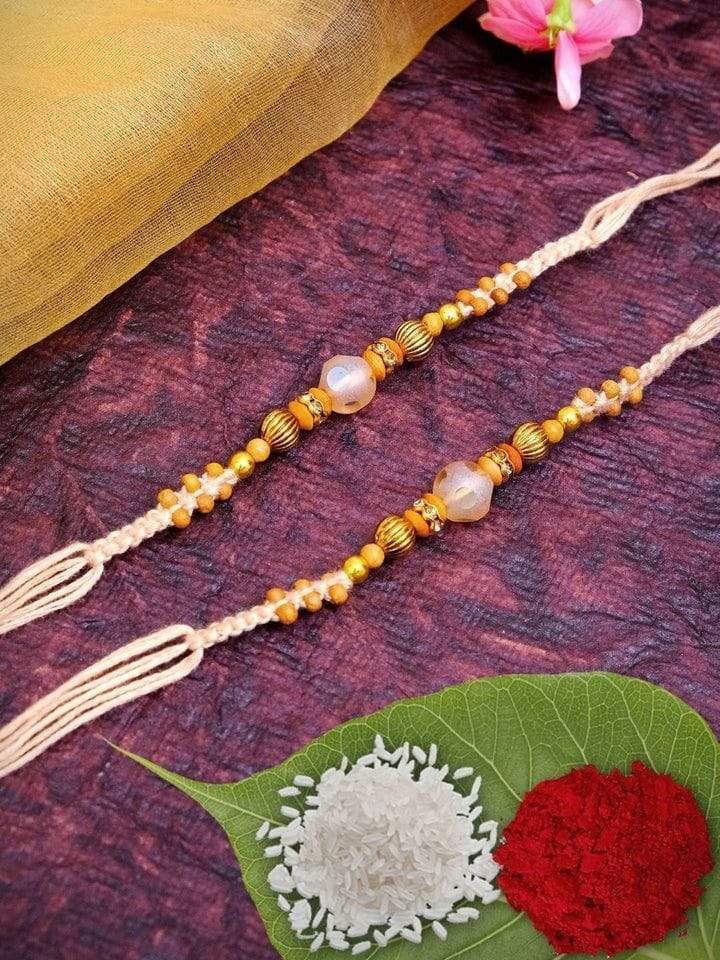 Traditional Pearl Beaded Rakhi Set with Golden Designer Beads