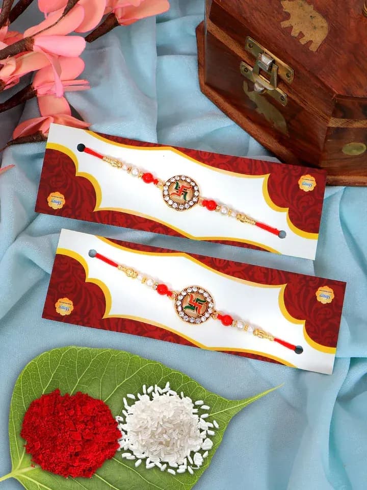Swastik Pearl Rakhi Combo Set with Red Beads Design