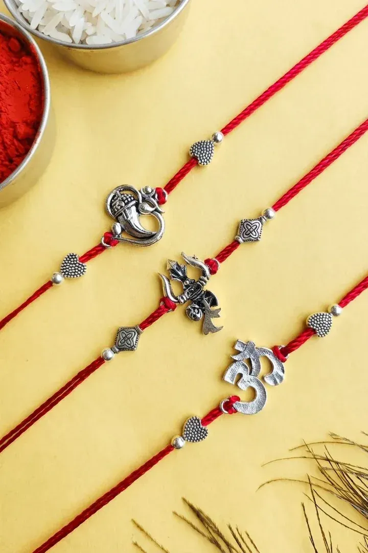 Oxidised Silver Om Ganesha Rakhi Combo Set with Red Thread