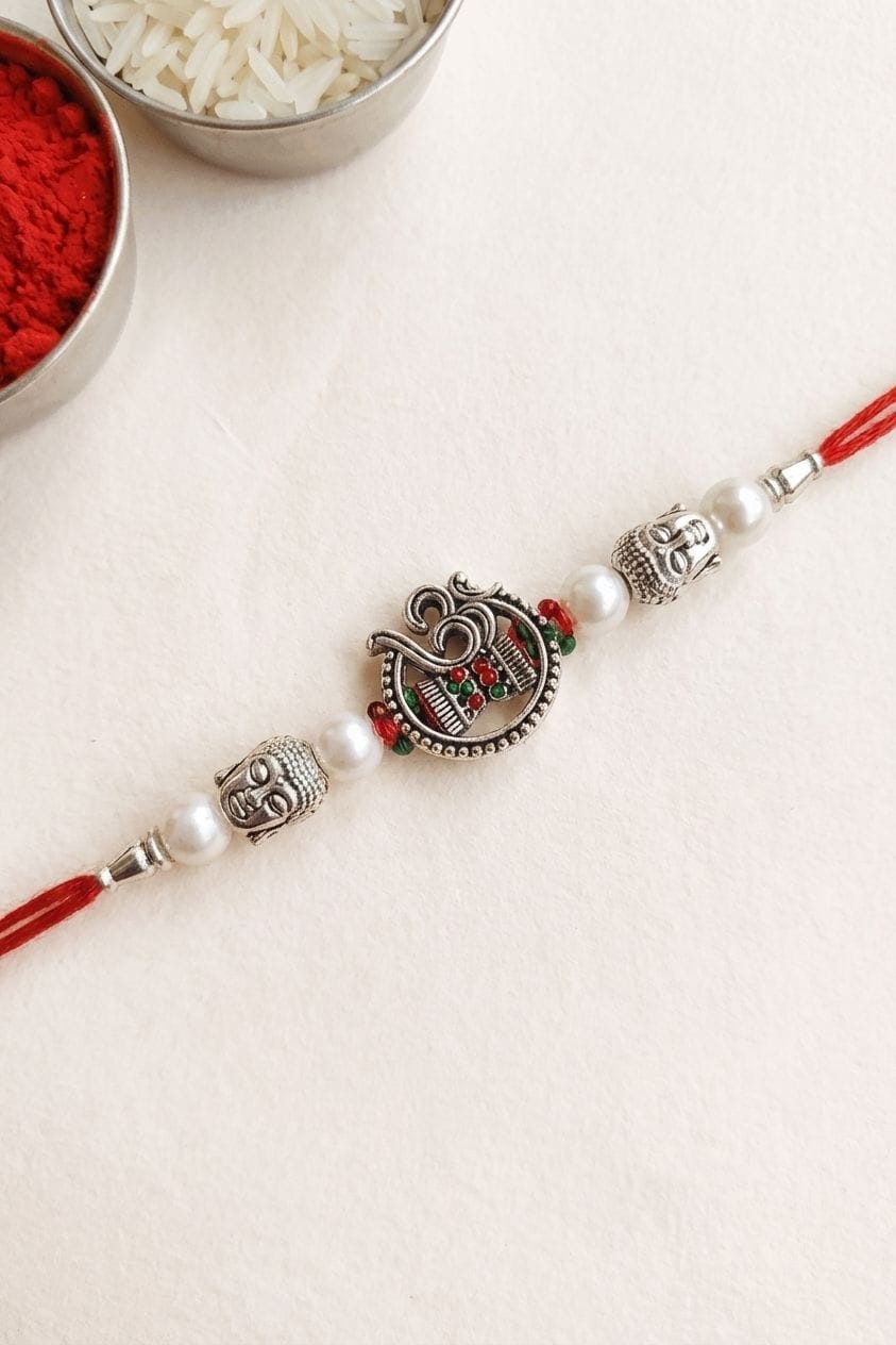 Premium Oxidised Om and Buddha Pearl Rakhi for Brother