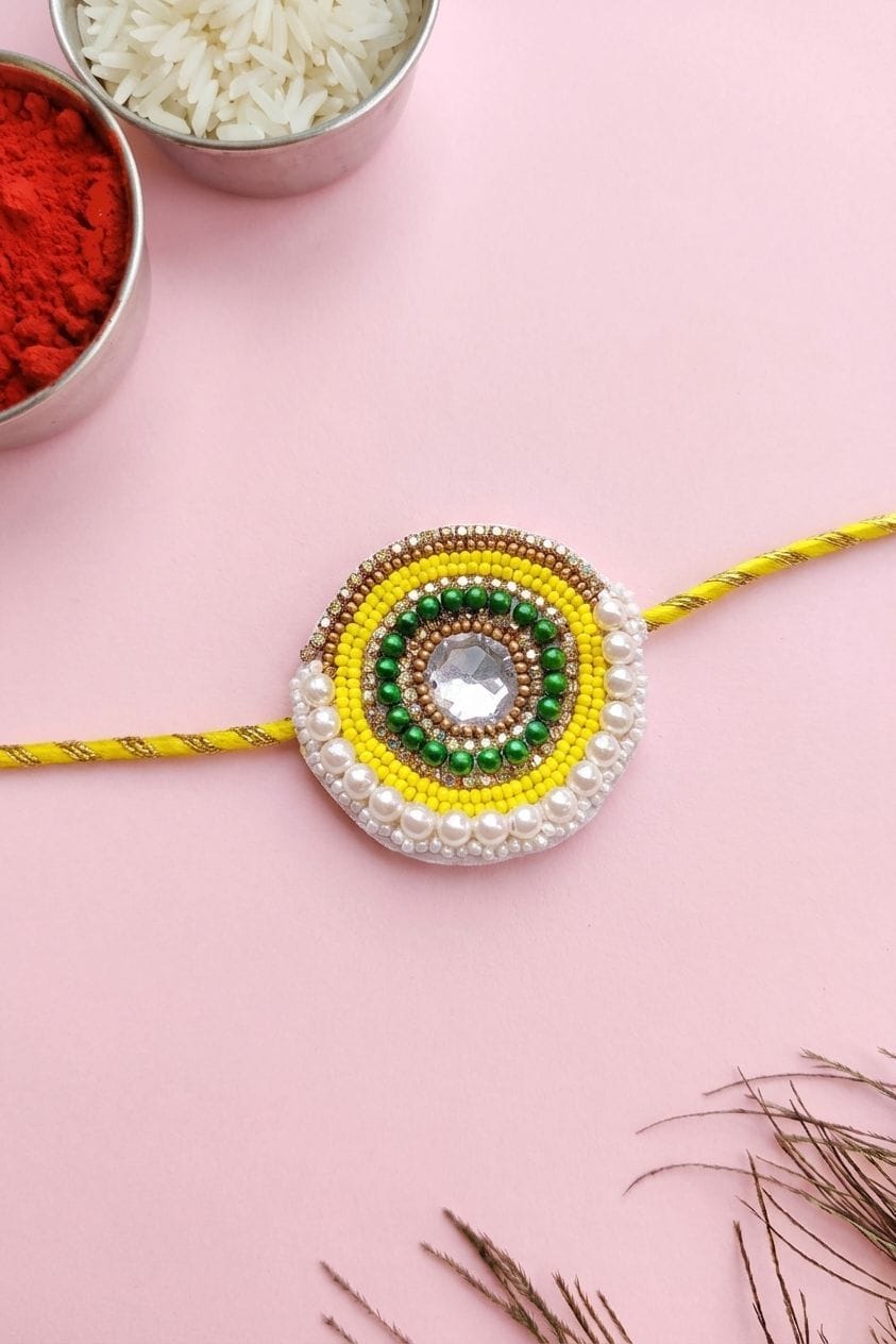 Handcrafted Yellow Mirror Work Rakhi for Brother