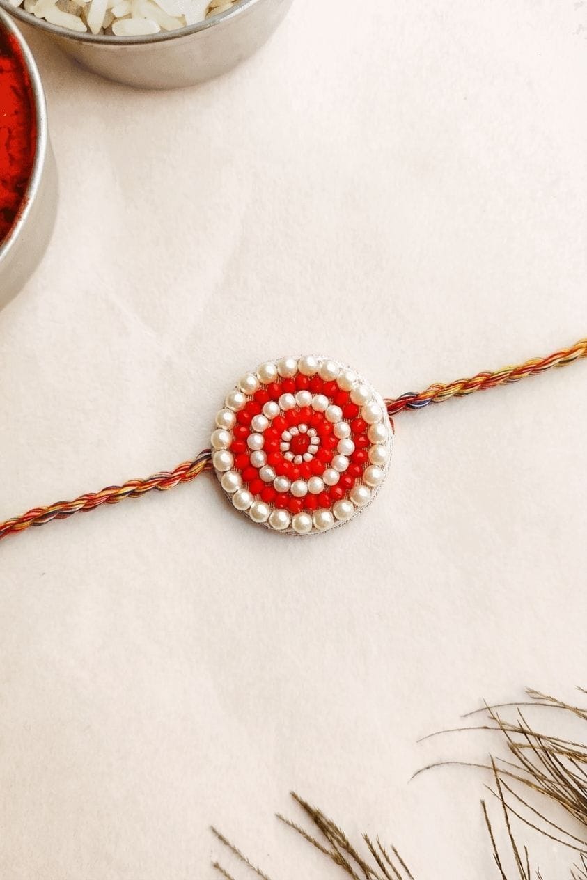 Red Pearl Round Designer Rakhi for Brother