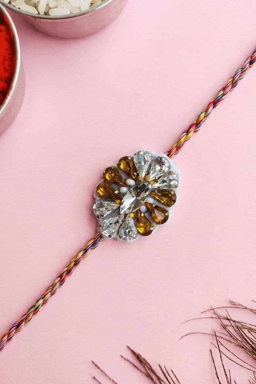 Designer Crystal Stone Rakhi with Floral Sparkle Design