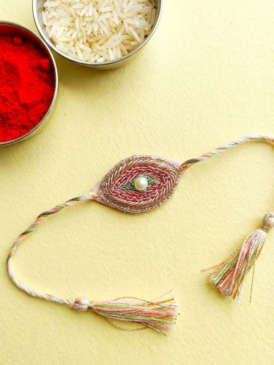 Elegant Pearl Tassel Rakhi with Handmade Embroidery