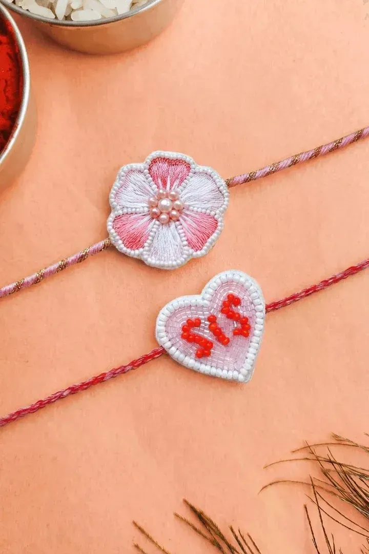 Handmade Floral and SIS Heart Rakhi Combo Set for Siblings